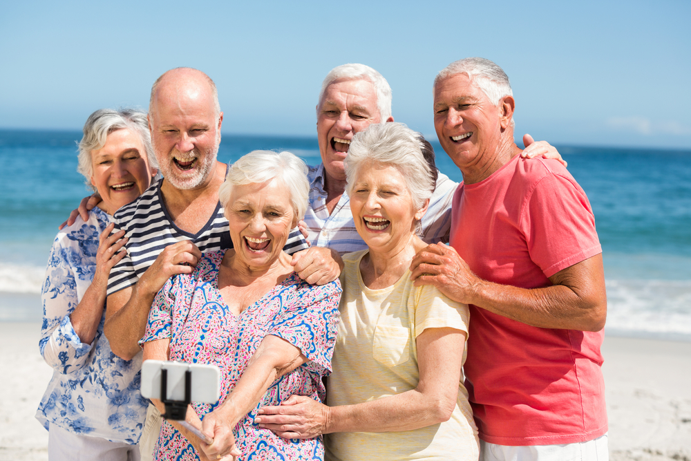 baby boomers having fun at the beach
