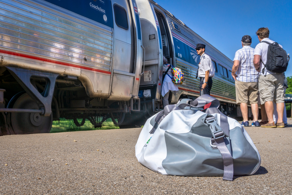 People entering in a Amtrak train