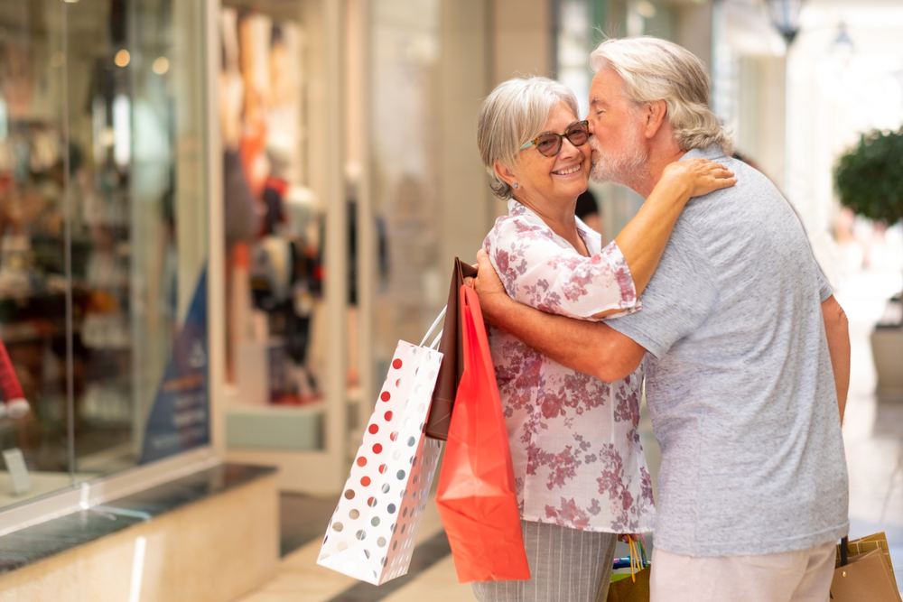 Happy seniors at shopping