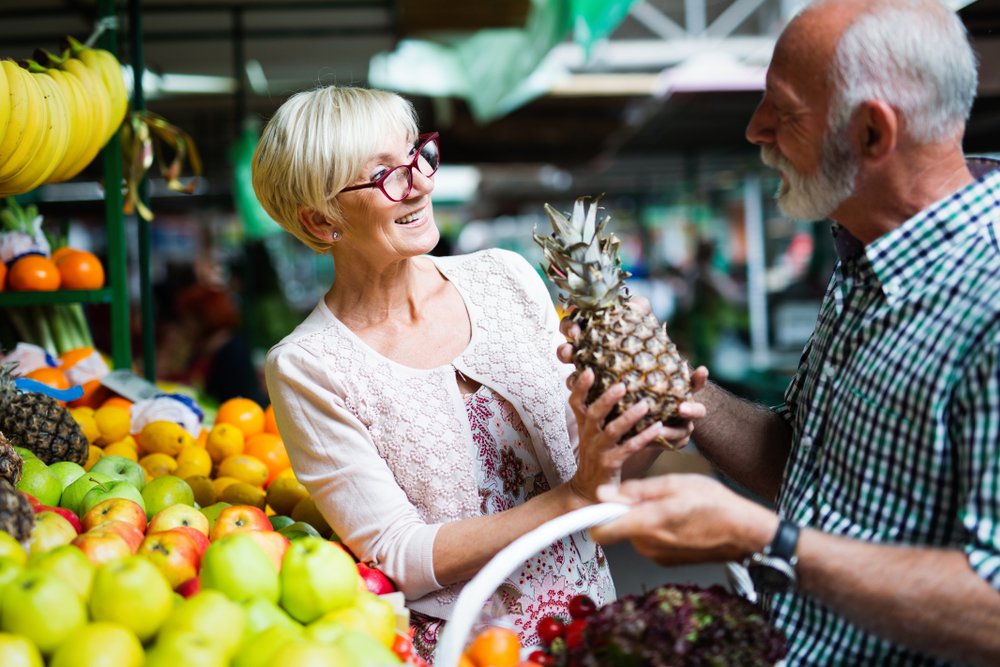 Seniors couple at a grocery store